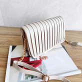 کیف کوچک مجلسی کرم رنگ